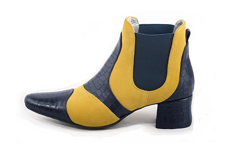 Women's navy blue and yellow elegant two-tone Chelsea ankle boots, with side elastics. Round toe. Low flare heels - Profile view